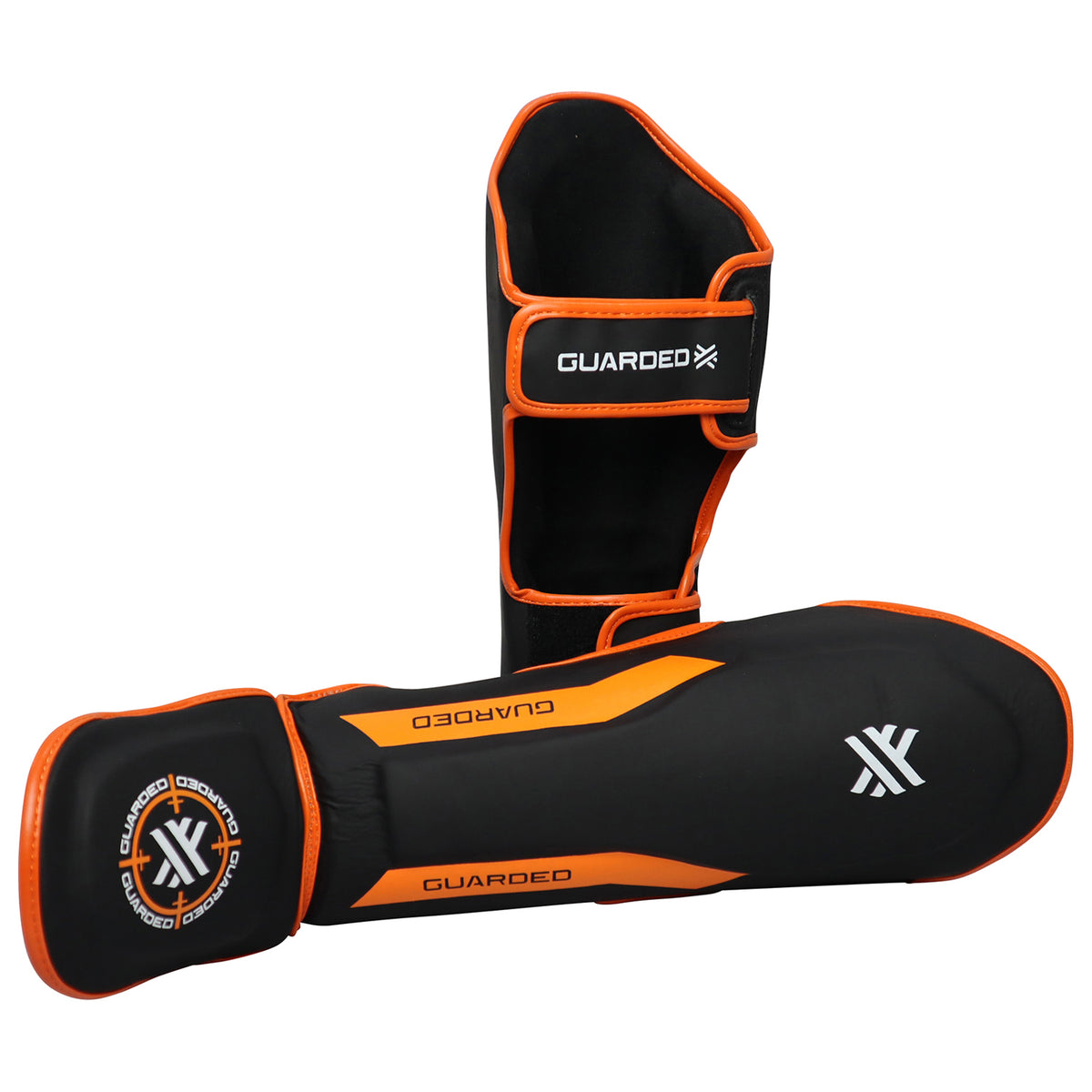 KIDS MUAY THAI SHIN GUARDS - MATTE BLACK / ORANGE